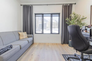 Front office with pull out couch off the front entrance with views of Fernie ski hill