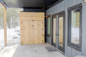 rear covered patio with ski storage