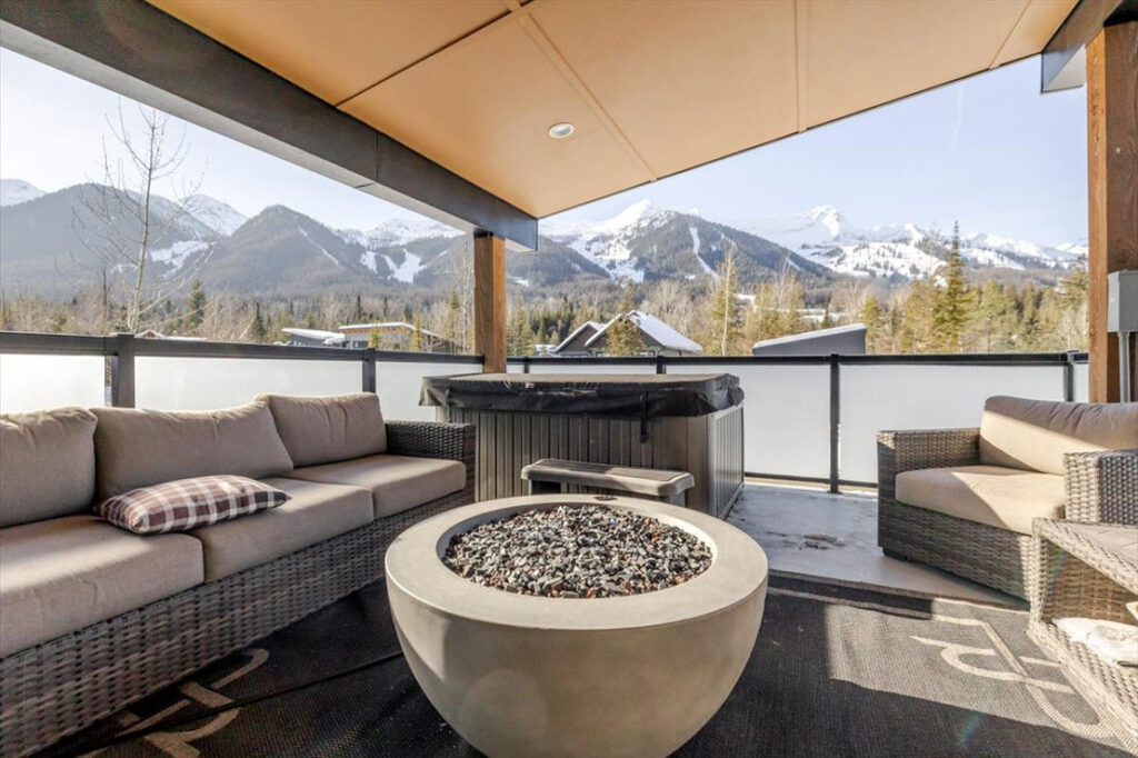 Front deck with hot tub to soak soar muscles with ski hill headwall views