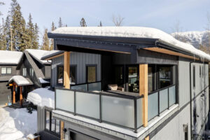 Deck over the garage with hot tub & fireplace with views of the Fernie ski resort