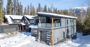 2 storey home with ample parking and side driveway to rear walkout basement.