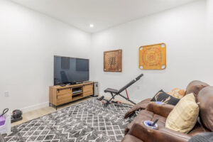 Basement media room with soundproof walls and ceilings